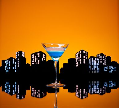 Metropolis Blue Martini cocktail in skyline setting