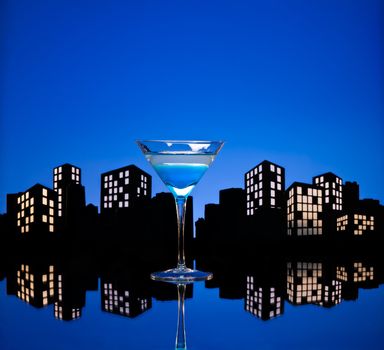 Metropolis Blue Martini cocktail in skyline setting