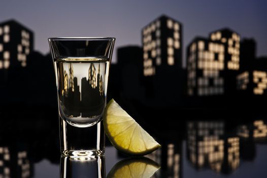 Tequila shoot in colorfull cityscape setting