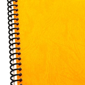 orange notebook texture isolated on white background