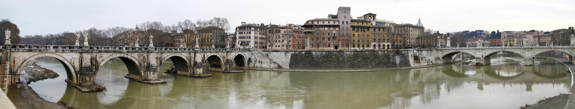 Wide view of the bridges over river Tiber in Rome, Italy.