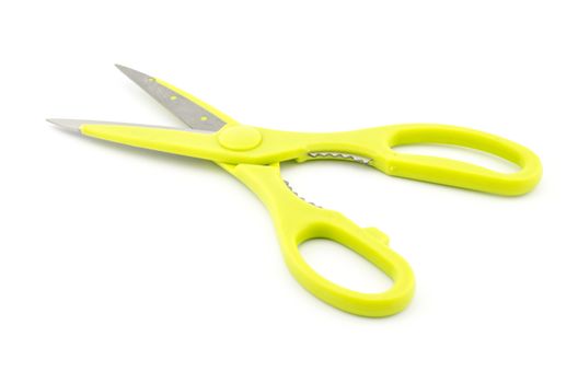 green used scissors isolated on white background