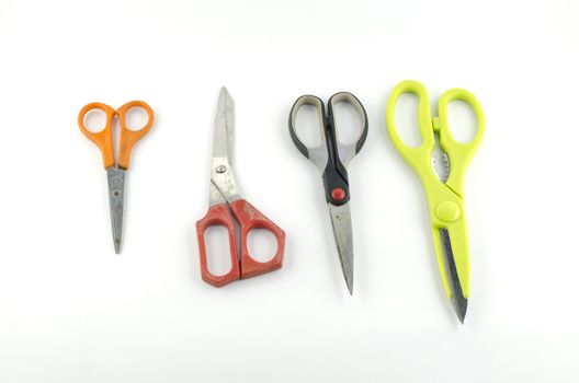 four used Scissors isolated with white background