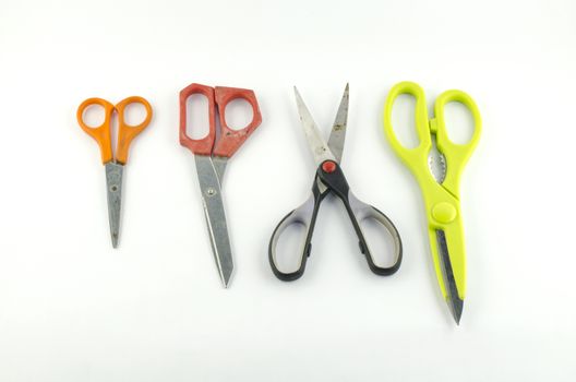 four used Scissors isolated with white background