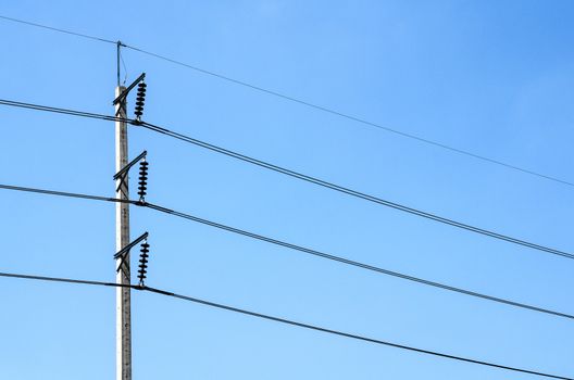 Electricity post on blue sky