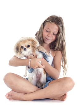 young girl and dressed chihuahua in front of white background