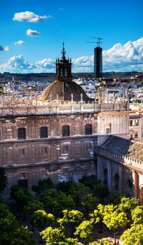 Cityscape, City View, from Giralda Spire, Bell Tower, Orange Garden, Dome Seville Cathedral, Andalusia Spain.  Built in the 1500s.  Largest Gothic Cathedral in the World and Third Largest Church in the World.  Burial Place of Christopher Columbus.  