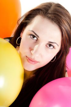 Shot of beautiful woman with multicolored air balloons