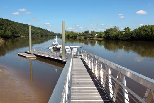 Wooden jetty leading to a boat