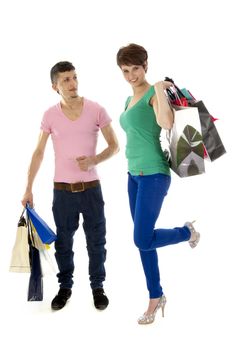 a couple with shopping bags on a white background