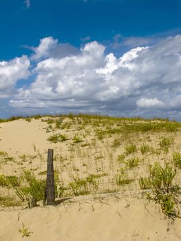 Sand Dunes with a blue sky with clouds on a Sunny day, in France