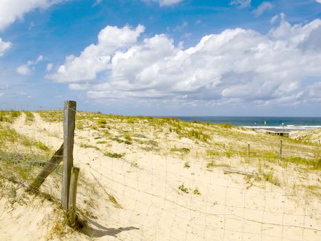 Sand Dunes with a blue sky with clouds on a Sunny day, in France