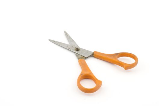 orange used scissors isolated on white background