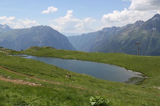 High Mountain lake with reflection on a sunny day