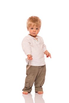 Full length portrait of a young boy. Isolated on white background