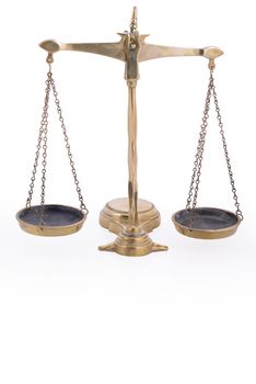 Balance scales symbol of justice on white backround with reflection