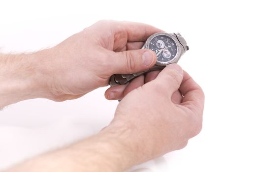 setting the time on a wrist watch 