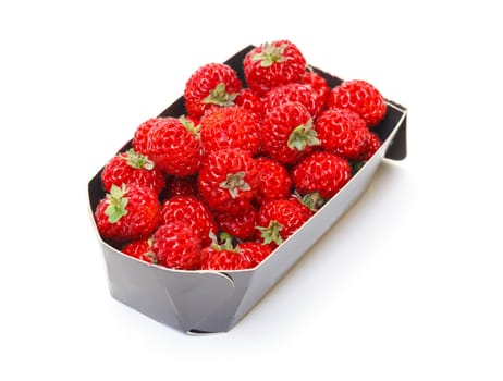 Ripe Red strawberries in paper box, on white background 
