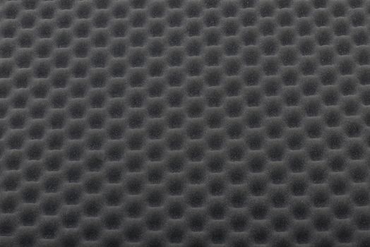 dark grey packing or acoustic foam