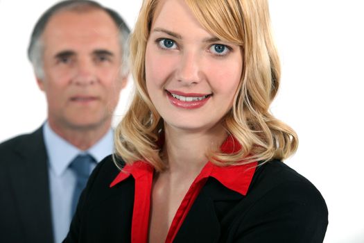 Businessman stood with assistant