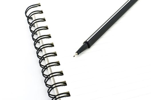 black pen with notebook isolated on white background