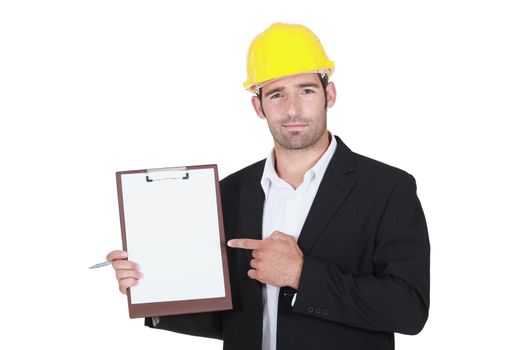Worker holding clipboard