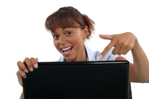 Woman pointing to laptop