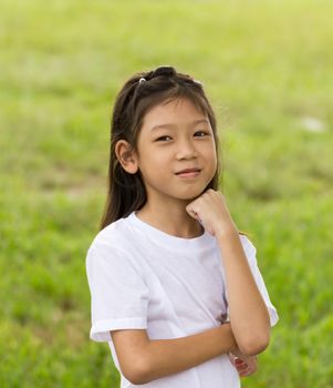 Outdoors portrait of beautiful Asian young girl