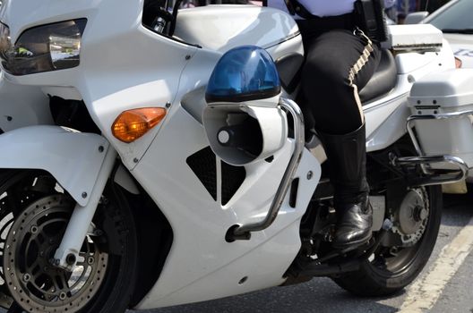 Police Man Riding on Motorbike