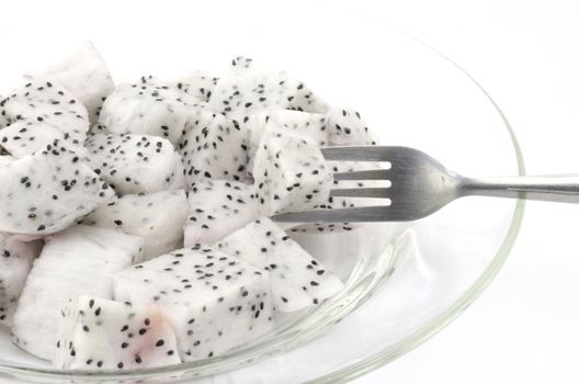 dragon fruit on dish isolated on white background