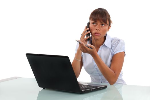 Young businesswoman with laptop