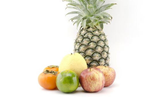 pineapple chinese pear persimon and green orange isolatedon white background