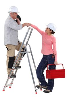 Experienced tradesman meeting his new apprentice for the first time