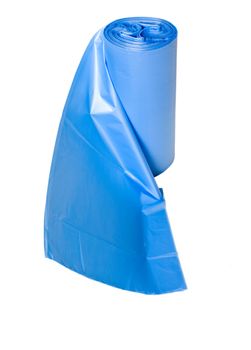 Roll of blue trash bags on bright background