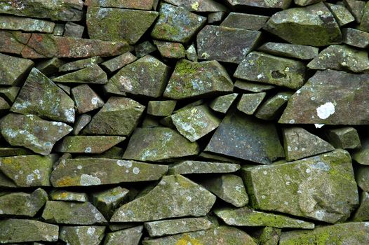 A background texture of a Scottish dry stone wall or dyke