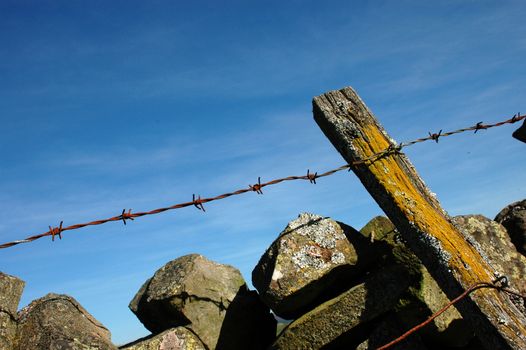 Agriculture Image Of Dry Stone Wall And Barbed Wire