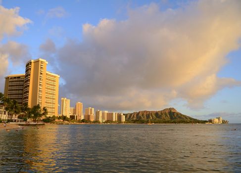 Waikiki, Hawaii, Bathed In Golden Evening Sunlight