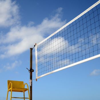 Sport Image Of A Volleyball Net On A Beach With A Referees Chair