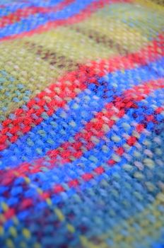 A Woven Woollen Picnic Blanket With Shallow Depth Of Focus