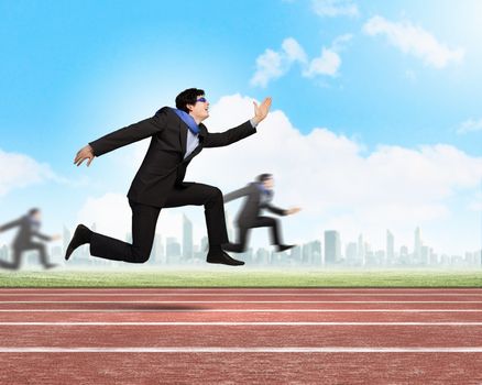 Funny image of running businessman at stadium. Competition concept
