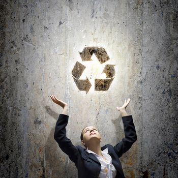 Image of businesswoman and recycle symbol. Ecology concept