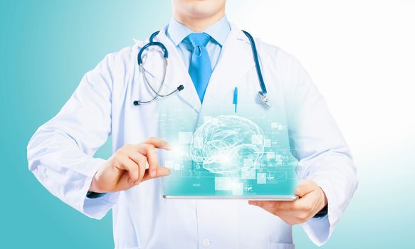 Close up of doctor's body holding tablet pc with media illustration