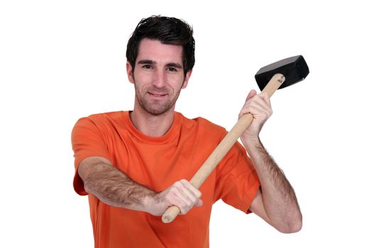 Man holding a mallet