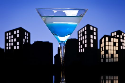 Metropolis Blue Martini cocktail in skyline setting