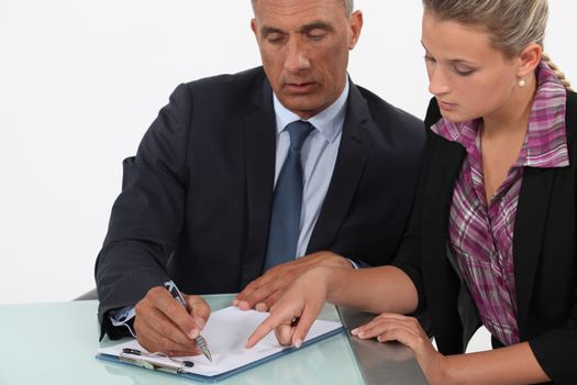 businessman and assistant making a plan