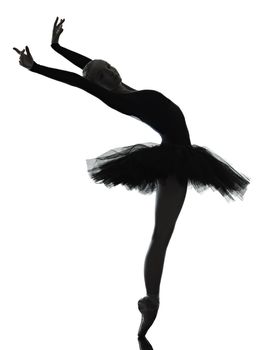 one caucasian young woman ballerina ballet dancer dancing with tutu in silhouette studio on white background