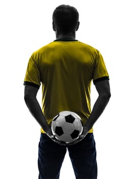 one caucasian man holding soccer football silhouette rear view back  in silhouette on white background