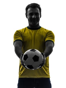 one caucasian man showing giving soccer football  in silhouette on white background
