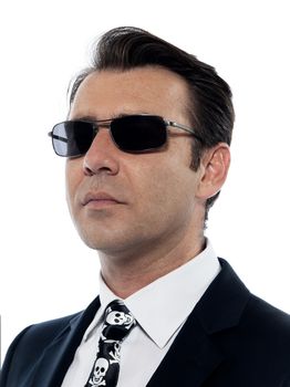 one Man caucasian criminal portrait serious wih sunglasses in studio isolated on white background