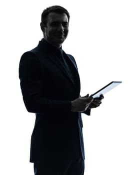 one caucasian business man holding digital tablet   posing portrait  on white background